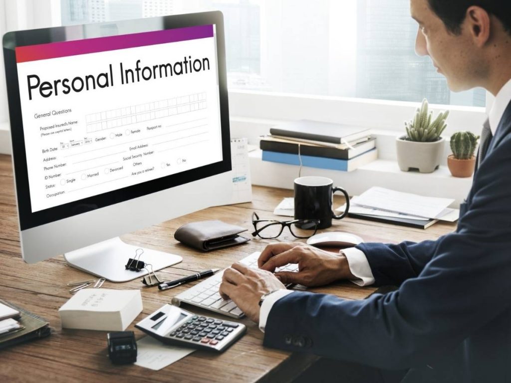 filling up personal information for rental application form in a computer